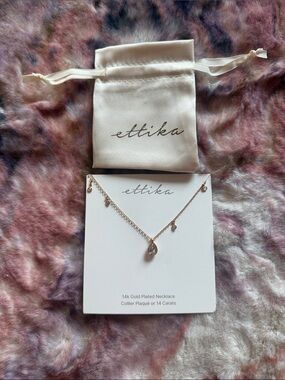 ettika rose gold plated necklace with clear teardrop crystal
